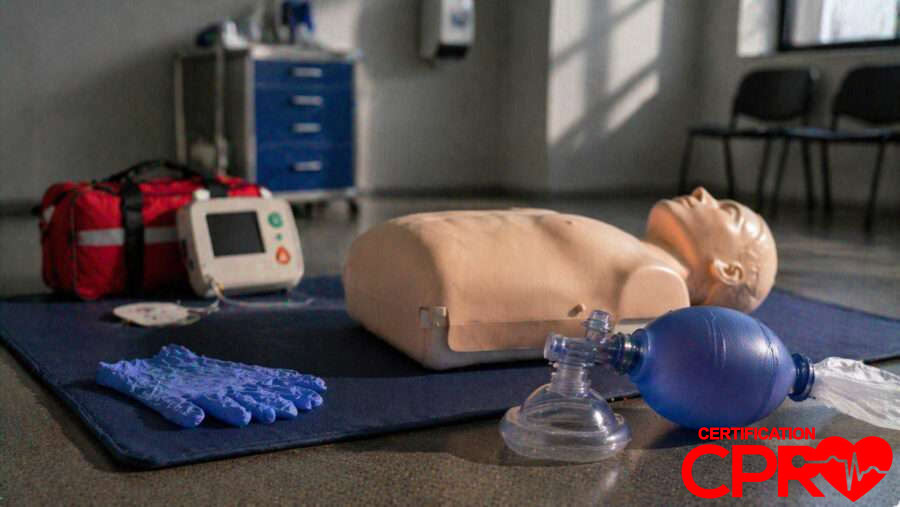 CPR training manikin with AED and rescue mask for certification in Laredo.
